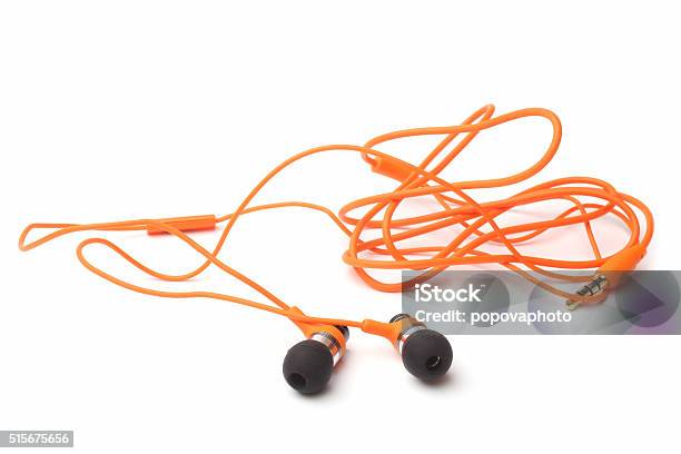 Earphones Stock Photo - Download Image Now - Cut Out, Headphones, In-ear Headphones
