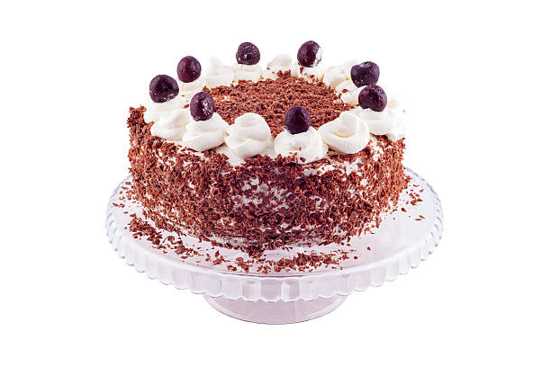 istock Black forest cake decorated with whipped cream and cherries. 515677578