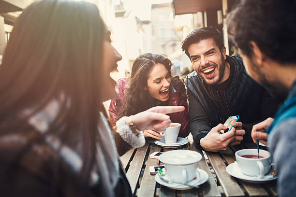 istock Two couples having fun in cafe outdoors 515678022