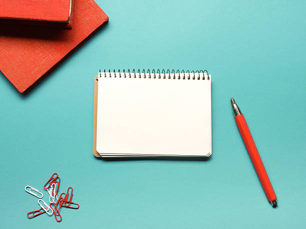 istock Office desk table with supplies and crumpled paper. Top view 515679052