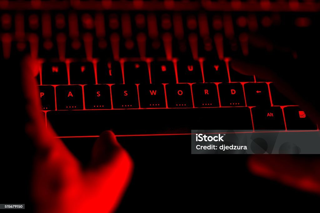 Ghacker Hacker Typing On The Illuminated Keyboard By Night Stock Photo ...
