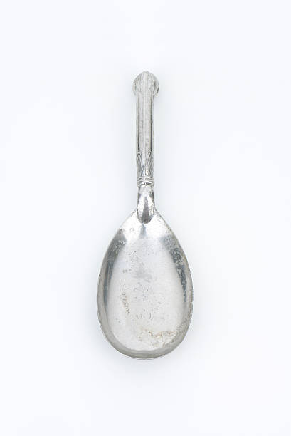 antique serving spoon antique serving spoon with decorative handle serving utensil stock pictures, royalty-free photos & images