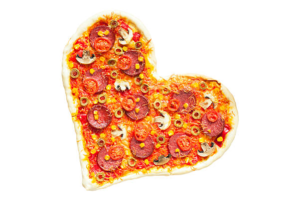 istock Pizza heart shaped with pepperoni, isolated on white background 515680414