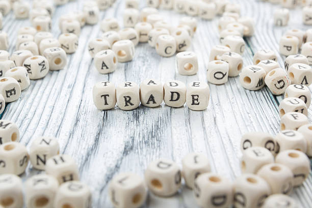 istock TRADE word background on wood blocks. Wooden ABC 515681732