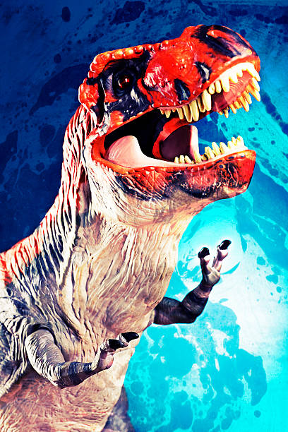 istock Aggressive Tyrannosaurus Rex on a Blue Background 515682897