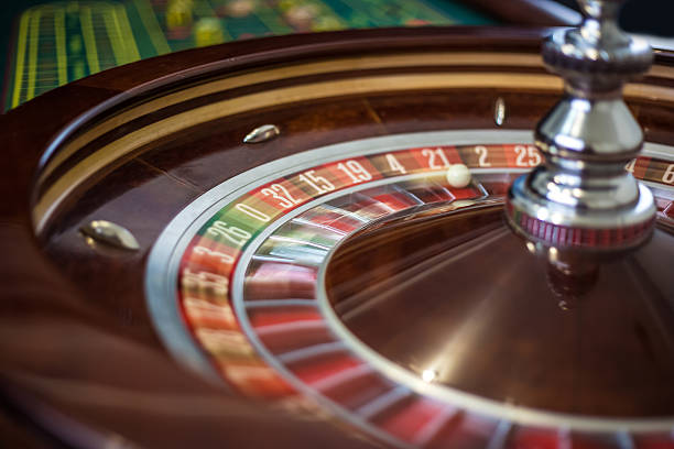 istock Casino roulette wheel with red sector twenty-one and ball. 515683120