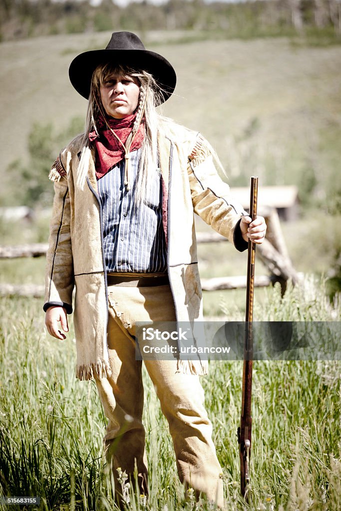 Farmer with rifle A man dressed as an early 19th century American farmer holding a shotgun, Parade Rest Ranch, Montana, USA.  Actor Stock Photo