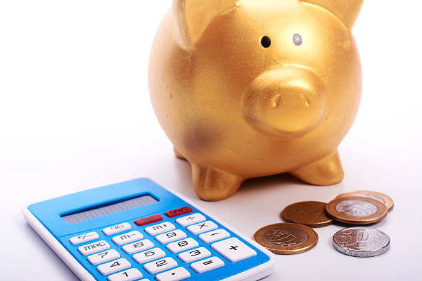 istock Safe piggy with calculator and coins from Brazil 515683538
