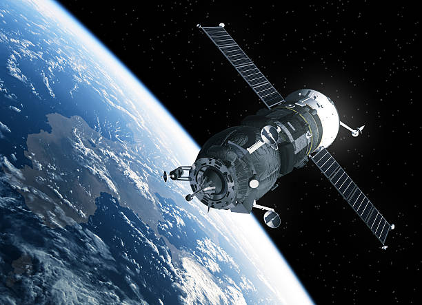 Cargo Spacecraft Orbiting Earth Cargo Spacecraft Orbiting Earth. 3D Scene. international space station photos stock pictures, royalty-free photos & images
