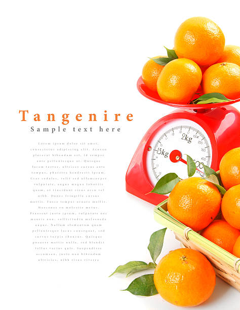 istock Tangerines on scales and in a basket 515683677