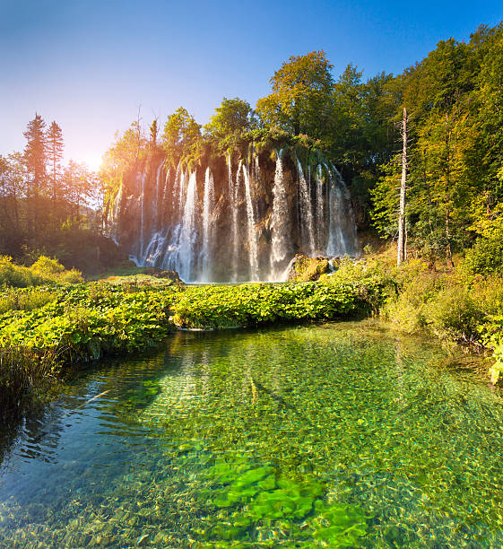 istock Landscape of a beautiful rock with a waterfall 515684363