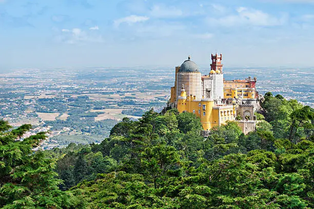 The Pena National Palace is a Romanticist palace in Sao Pedro de Penaferrim, Sintra, Portugal