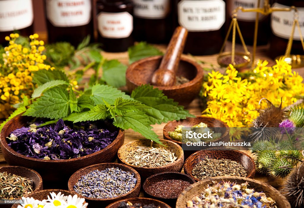 Natural medicine, herbs, mortar Natural medicine Herbal Medicine Stock Photo
