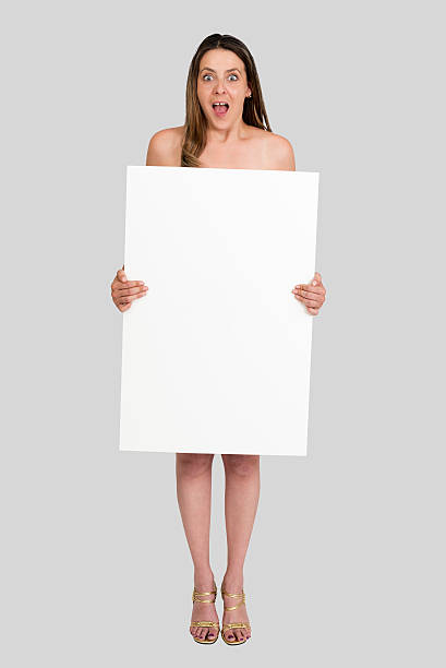 ヌード空の看板を持つ女性 - advertisement advertise businesswoman peeking ストックフォトと画像