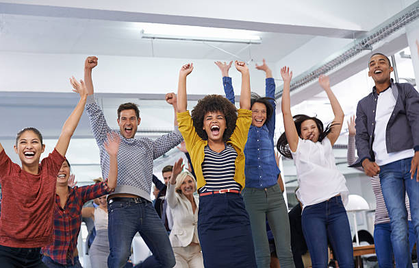 当ホテルではすべての受賞者 - jumping business women dancing ストックフォトと画像