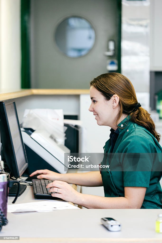Veterinary Stock Photo Using Computer Veterinary Surgeon Working On Computer Stock Photo - Download Image Now ...