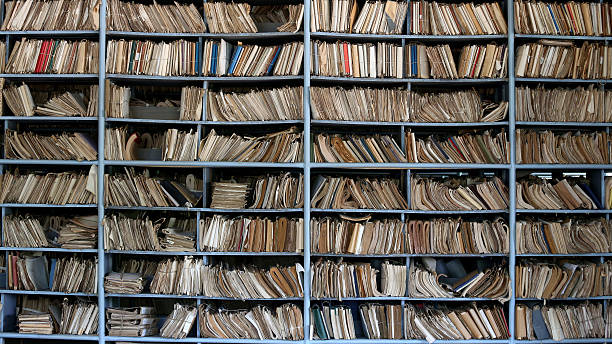 Old archive Shelves full of files in a messy old-fashioned archive filing cabinet photos stock pictures, royalty-free photos & images