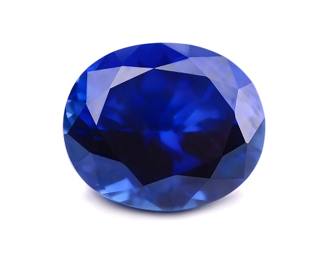 Natural sapphire gemstone isolated on white