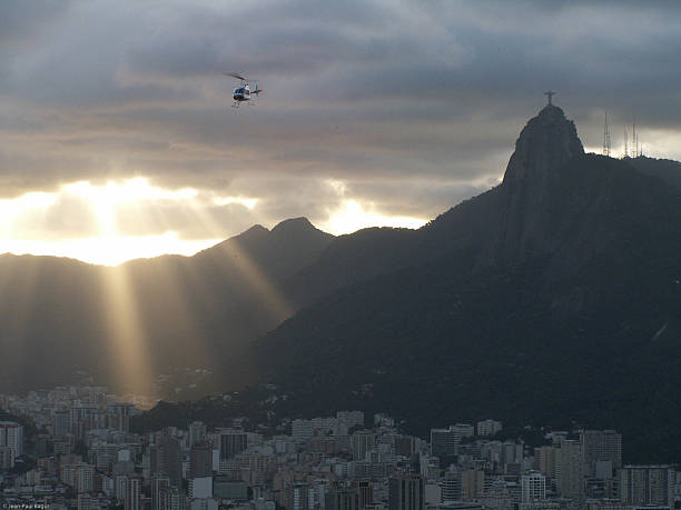 istock Christ Redeemer And Rio Sunset With Helicopter 515702199