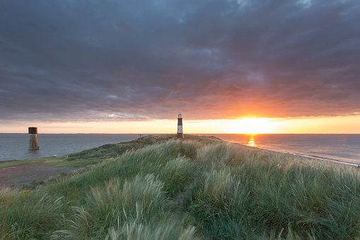 Spurn Point or Spurn Head lighthouses at dawn, East Yorkshire