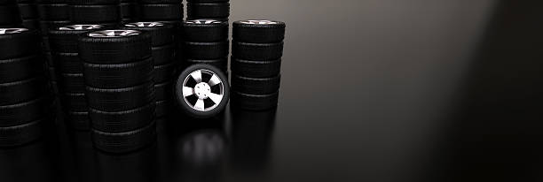 Several stacks of car tires stock photo