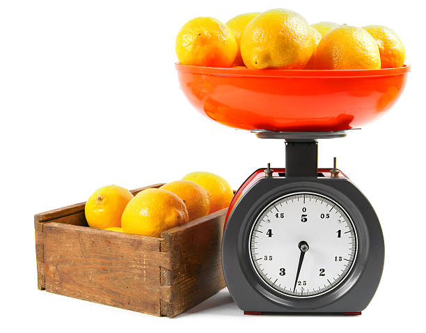 istock Lemons on scales and in a box 515703615