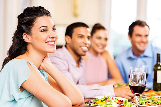 istock Woman Looking Away With Friends At Dining Table In Restaurant 515704379