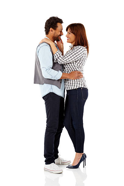 istock Romantic mature couple together over white 515704591