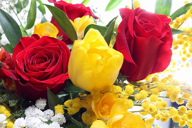 Bunch of blooming vibrant multicolored roses.