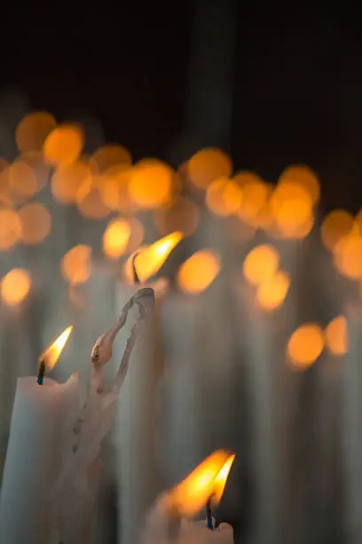 Photo of Candles burning in the church of Lourdes