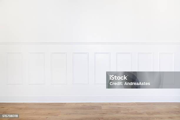 Empty White Room With Parquet Floor And Wood Trimmed Wall Stock Photo - Download Image Now