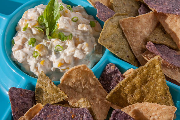 istock Delicious spicy corn dip with tortilla chips 515709762