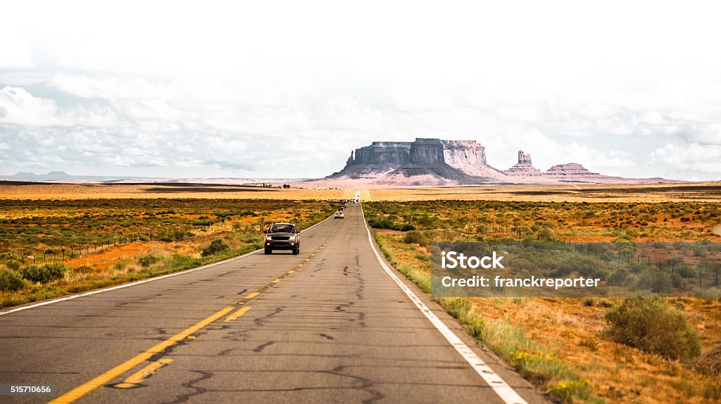 on the road on the Monument valley national park Monument valley panoramic view Arid Climate Stock Photo