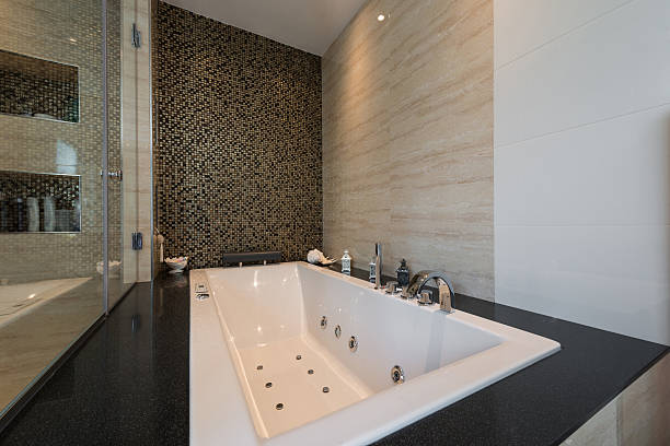 Interior of a luxury mansion, beautiful bathroom with hot tub
