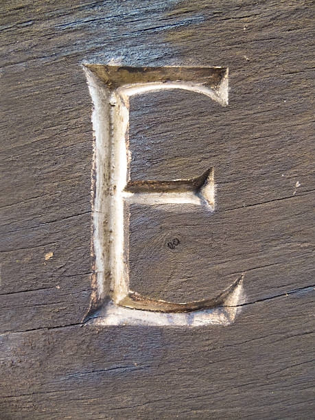 istock capital e carved in wood 515710950