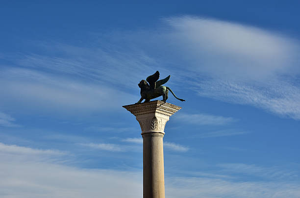 istock Venice Lion column in Sain Mark Square with beautiful sky 515711432