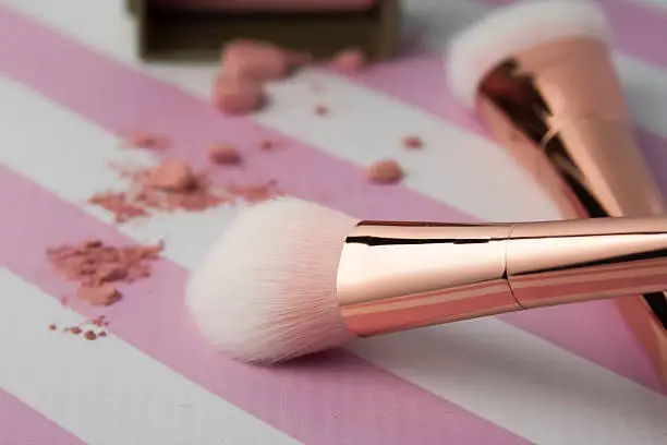 Photo of Gorgeous rose gold makeup brushes with pink blush