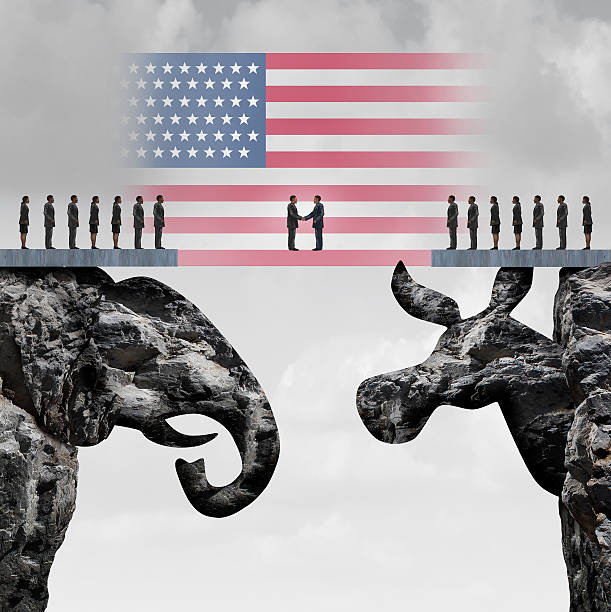 Bipartisan Agreement Bipartisan agreement between the republican and democrat organiization as a symbol for a two party system with a flag of the United States connecting two mountain cliffs shaped as an elephant and donkey. left wing politics stock pictures, royalty-free photos & images