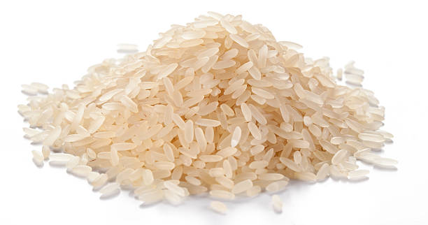 istock Handful of rice. 515717278