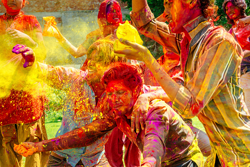 Happy indian people celebrating Holi Festival