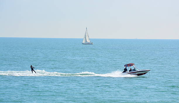 istock Wakeboarder,motorboat and sailboat. 515718309