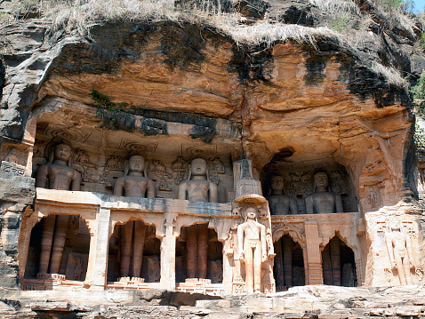 Ancient statues in the hole of rock on the way to Gwalior fort in Gwalior, India. Gwalior is a historical and major city in the Indian state of Madhya Pradesh. It is located to the south of Agra, 319 km south of Delhi.