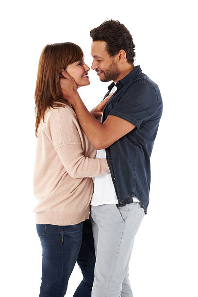 istock Romantic interracial couple together on white 515719891