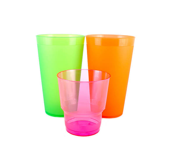 istock Green, orange and pink cups 515721583