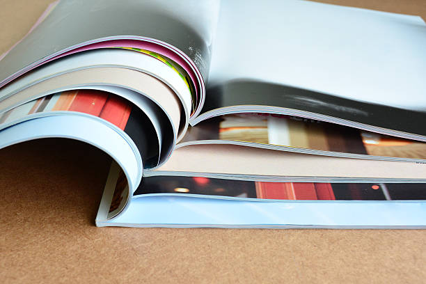 istock Pile of magazines on table. 515724543