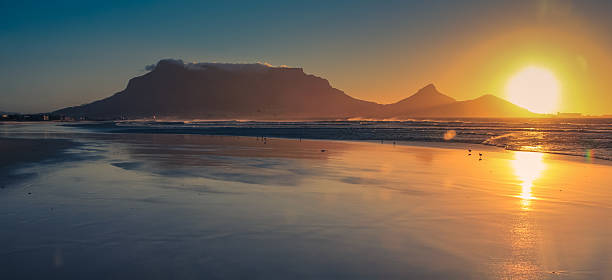 istock Beautiful sunset at Milnerton beach, showing the Table Mountain 515735958