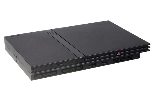 Adelaide, Australia - March 15, 2016:  A studio shot of a Playstation 2 (PS2) Slimline Game Console. Popular video game console sold worldwide by Sony.