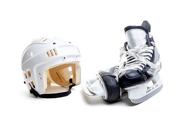 istock Ice Hockey Helmet and Skates Isolated on White 515737342