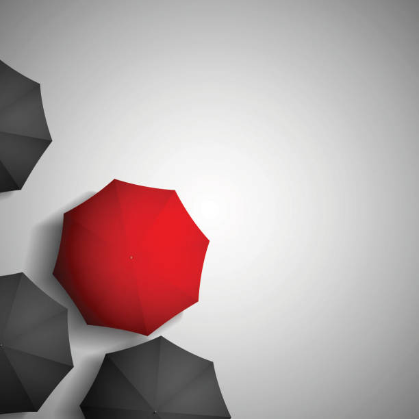 istock red umbrella on a background of black umbrellas 515742153