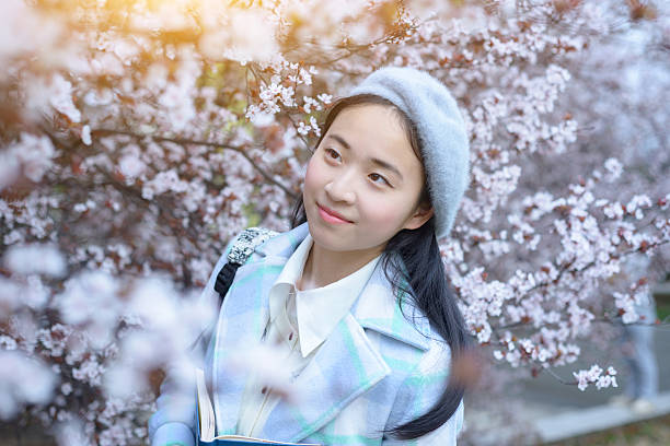 istock Japanese university students walking in the park 515742418